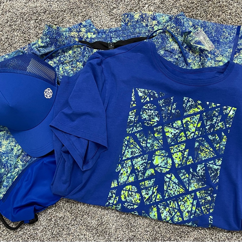 Lululemon SeaWheeze bundle. Hat, bag, mens size XL shorts, women’s xl shirt.